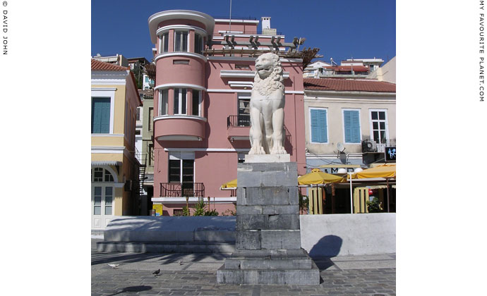 Marble lion statue on Pythagoras Square, Lower Vathy, the main town of Samos island, Greece at My Favourite Planet Marble lion statue on Pythagoras Square, Lower Vathy, the main town of Samos island, Greece at My Favourite Planet