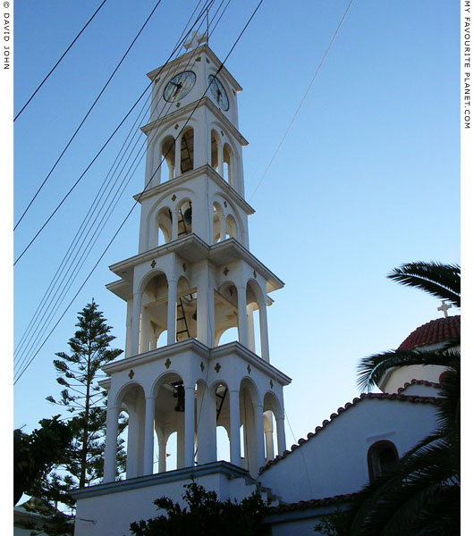 A wedding cake belltower with a clock in Chora village, Samos, Greece at My Favourite Planet A wedding cake belltower with a clock in Chora village, Samos, Greece at My Favourite Planet