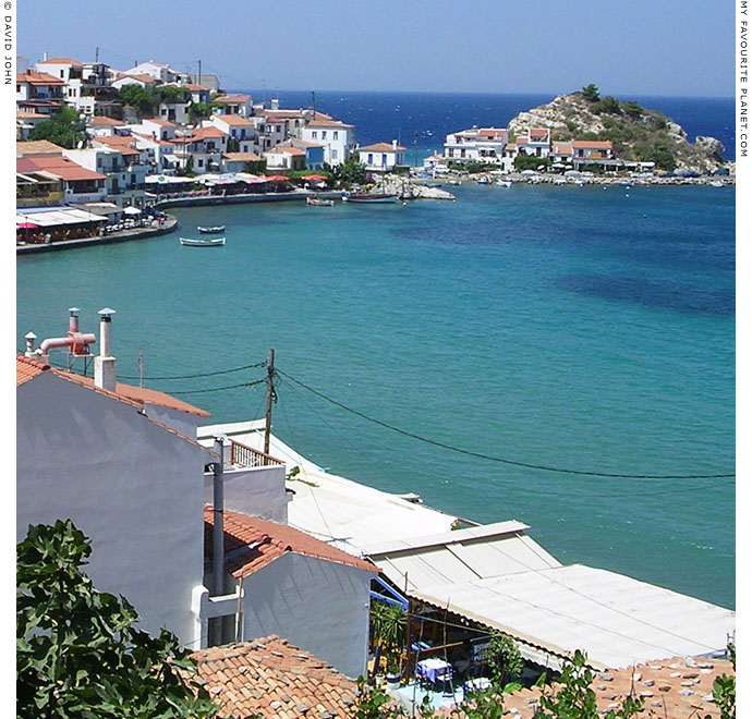 Restaurants along the seafront of Kokkari harbour, Samos, Greece at My Favourite Planet