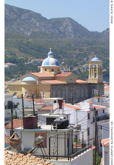 Agios Nikolaos Church over Kokkari rooftops at My Favourite Planet