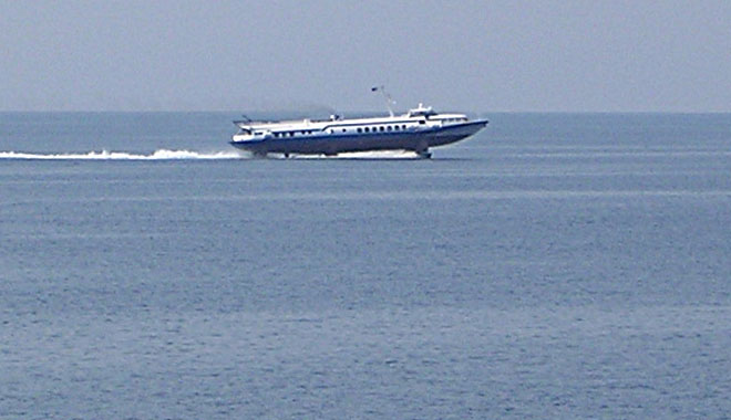 A flying dolphin hydrofoil ferry in sailing from Samothraki island to Alexandroupoli, Greece at My Favourite Planet A flying dolphin hydrofoil ferry in sailing from Samothraki island to Alexandroupoli, Greece at My Favourite Planet