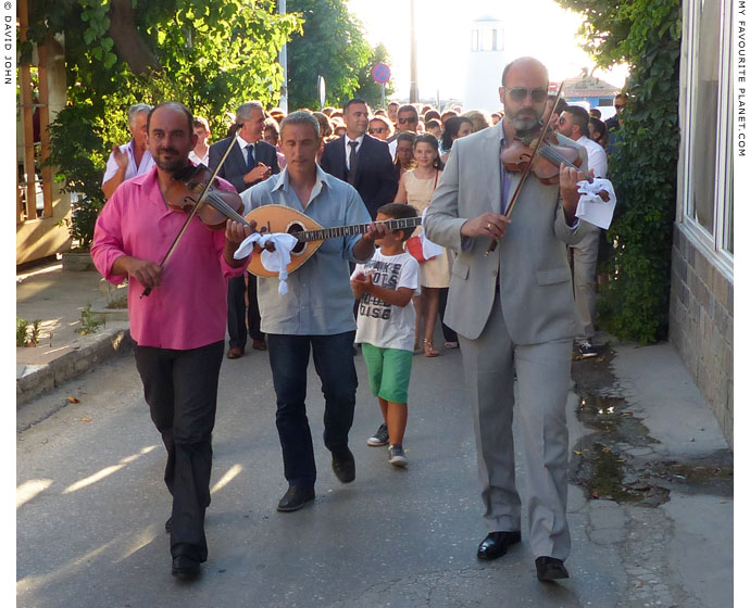 Musicians leading a wedding procession in Kamariotissa, Samothraki, Greece at My Favourite Planet
