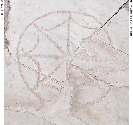 Marble paving stone with graffiti on Kuretes Street, Ephesus at My Favourite Planet