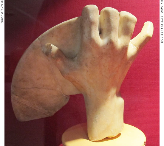 A marble right hand holding a discus at My Favourite Planet A marble right hand holding a discus at My Favourite Planet