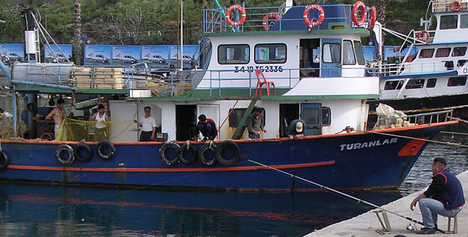 Fishermen prepare their boat in Kusadasi, Turkey at My Favourite Planet