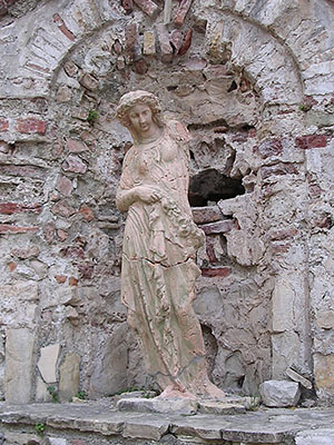 Statue of a young woman in the entrance to the Genoese fortress on Guvercin Ada (Pigeon Island), Kusadasi, Turkey at My Favourite Planet Statue of a young woman in the entrance to the Genoese fortress on Guvercin Ada (Pigeon Island), Kusadasi, Turkey at My Favourite Planet