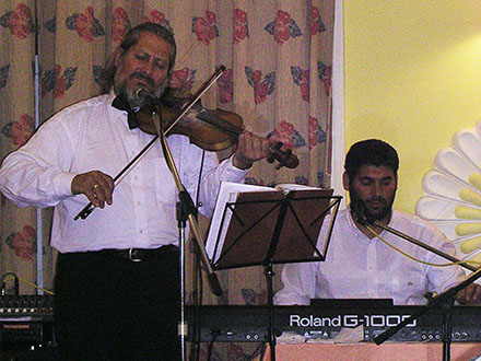 Turkish musicians playing in the restaurant of a hotel in Kusadasi, Turkey at My Favourite Planet