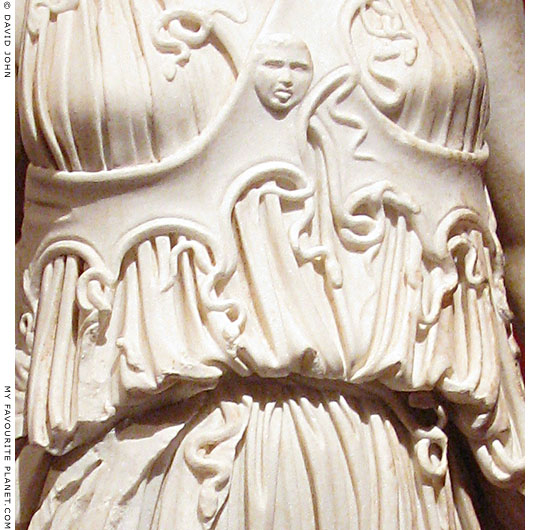 Detail of Athena's aegis and gorgon brooch, and the snake girdle of her peplos, Pergamon Museum, Berlin at My Favourite Planet Detail of Athena's aegis and gorgon brooch, and the snake girdle of her peplos, Pergamon Museum, Berlin at My Favourite Planet