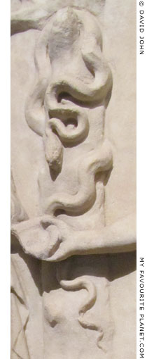 A snake entwined around a tree in the hero relief from Pergamon at My Favourite Planet A snake entwined around a tree in the hero relief from Pergamon at My Favourite Planet