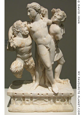 Statue of drunken Dionysus supported by Pan and a satyr at My Favourite Planet Statue of drunken Dionysus supported by Pan and a satyr at My Favourite Planet