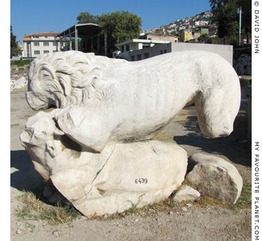 A statue of a lion attacking a bull in the ancient agora of Smyrna at My Favourite Planet