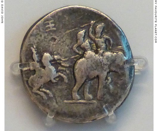 Silver decadrachm coin showing Alexander the Great fighting king Poros of Paurava on an elephant at My Favourite Planet Silver decadrachm coin showing Alexander the Great fighting king Poros of Paurava on an elephant at My Favourite Planet