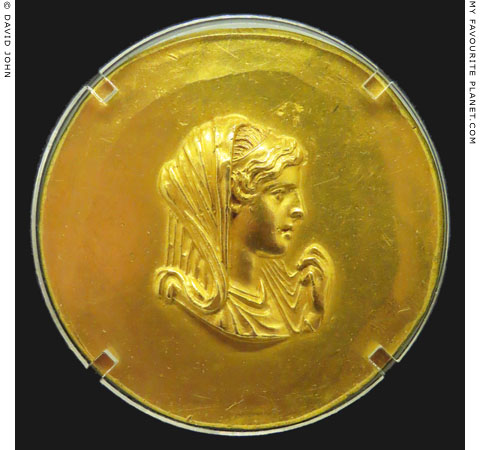 A portrait of Olympias, mother of Alexander the Great, on a gold Aboukir medallion in Thessaloniki at My Favourite Planet