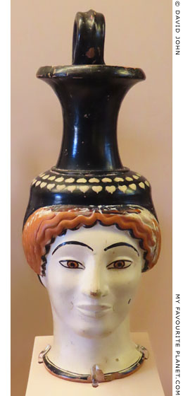 An Attic vase in the form of a female head signed by Midas at My Favourite Planet