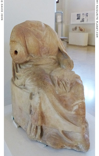 Statuette of Demeter sitting on the sacred kiste, Dion, Macedonia, Greece at My Favourite Planet