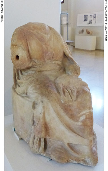 statuette of Demeter sitting on the sacred kiste, Dion, Macedonia, Greece at My Favourite Planet