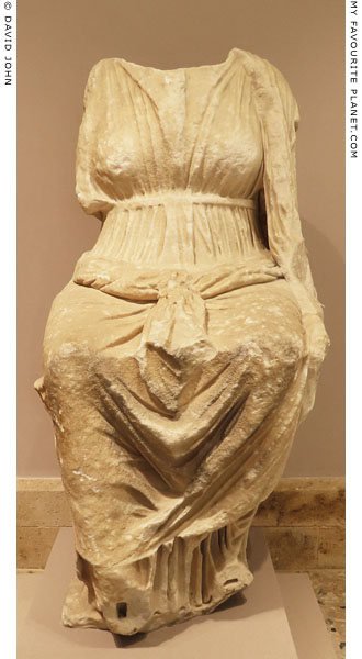 Statuette of Demeter sitting on the sacred kiste, Dion, Macedonia, Greece at My Favourite Planet