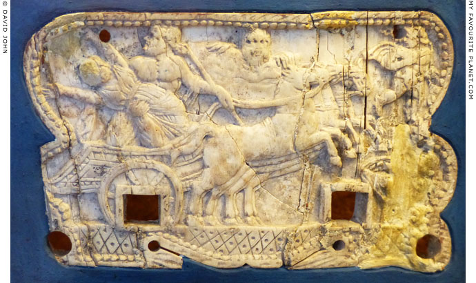 Plouton and Persephone by in a chariot on an ivory plaque at My Favourite Planet