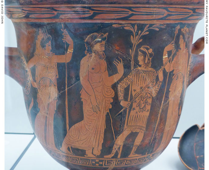 A bearded man and Triptolemos in the presence of Demeter and Persephone at My Favourite Planet