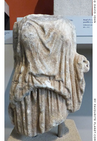 Fragment of a marble statuette of a female figure wearing a peplos at My Favourite Planet