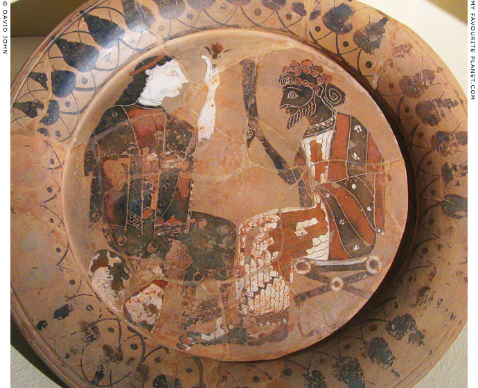 Attic plate depicting Dionysus and woman sitting together at My Favourite Planet