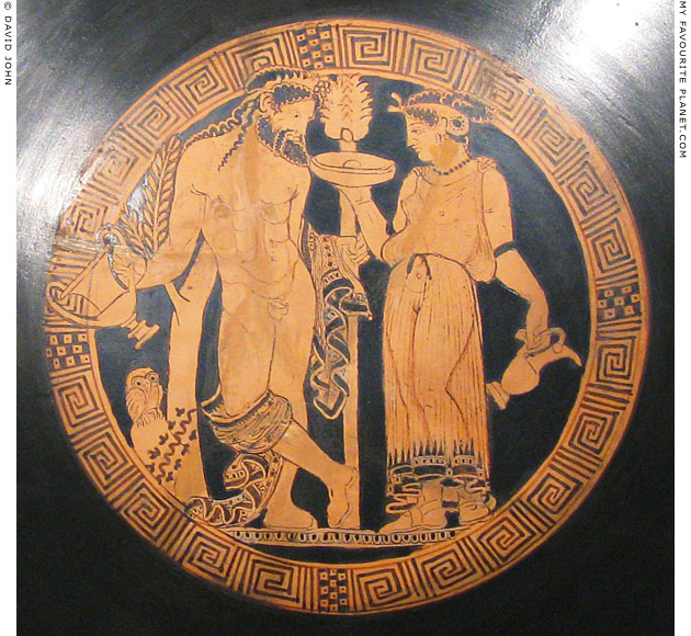 Etruscan kylix showing Dionysus/Fufluns with a female figure at My Favourite Planet