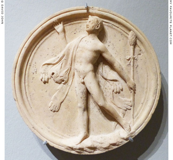 A dancing Satyr on a marble oscillum at My Favourite Planet