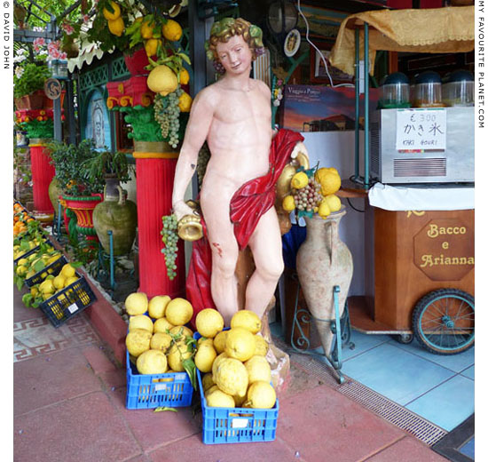 A modern plaster statue of Bacchus in Pompeii at My Favourite Planet