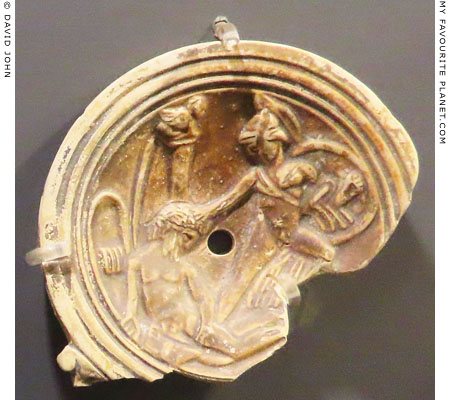 Two warriors fighting on an oil lamp in Rhodes at My Favourite Planet Two warriors fighting on an oil lamp in Rhodes at My Favourite Planet