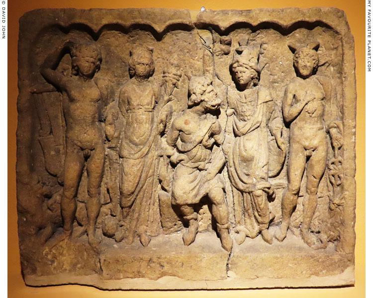 A sandstone relief depicting Vulcanus (Hepahaistos) in a group of five gods at My Favourite Planet