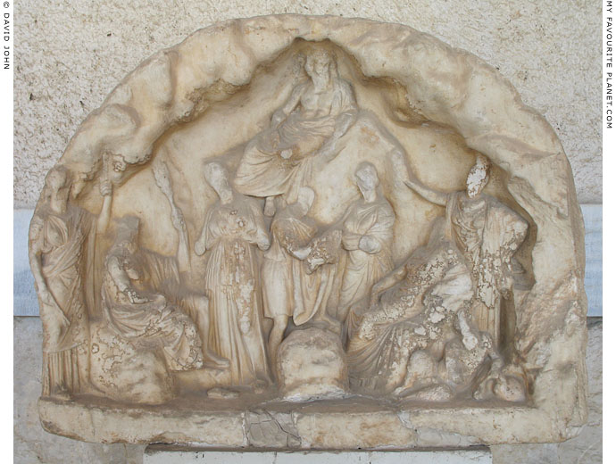Marble votive relief depicting Hermes presenting the infant Dionysus to the Nymphs in a cave at My Favourite Planet
