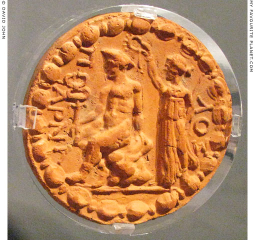 Ceramic disc depicting Nike crowning Hermes at My Favourite Planet
