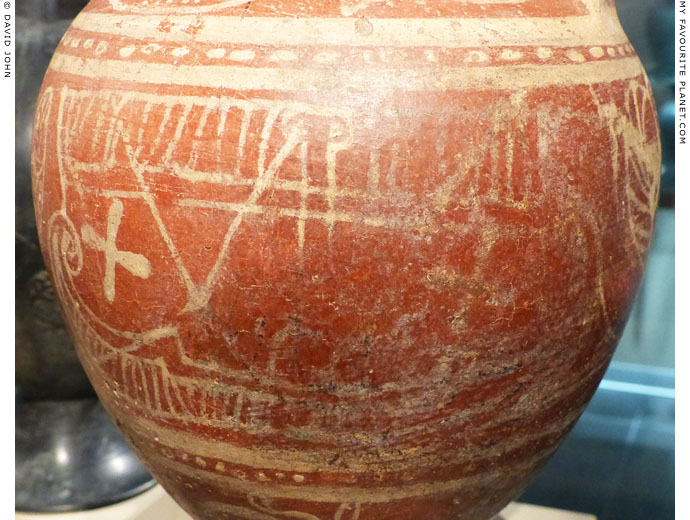 Painting of a man sitting in a ship on an Etruscan amphora at My Favourite Planet