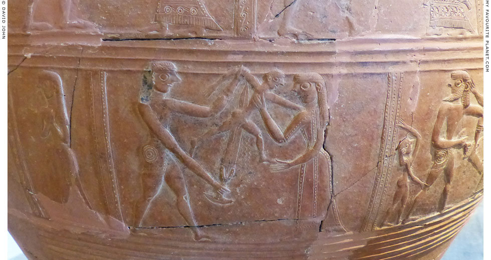 A Greek warrior killing a male child on the Mykonos Vase at My Favourite Planet A Greek warrior killing a male child on the Mykonos Vase at My Favourite Planet