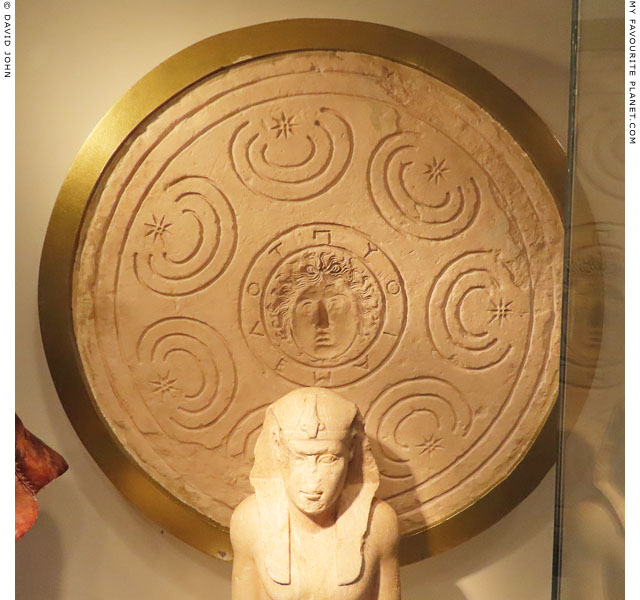 A Gorgoneion on a limestone model for a shield at My Favourite Planet