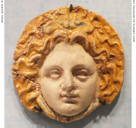 A painted terracotta plaque in the form of a Gorgoneion at My Favourite Planet A painted terracotta plaque in the form of a Gorgoneion at My Favourite Planet