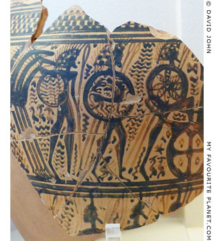 Warriors with round shields decorated with devices on an vase from Athens at My Favourite Planet