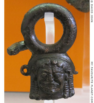 Bronze handle of a ritual vessel with a head of the Gorgon Medusa at My Favourite Planet