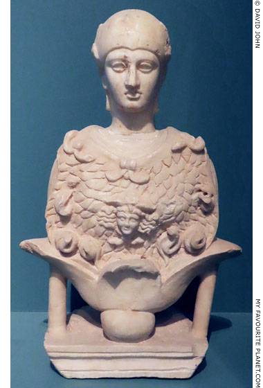 A bust of Athena wearing the aegis and a winged Gorgoneion from Eleusis at My Favourite Planet
