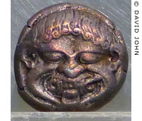 Coin of ancient Neapolis with a Gorgon's head at My Favourite Planet