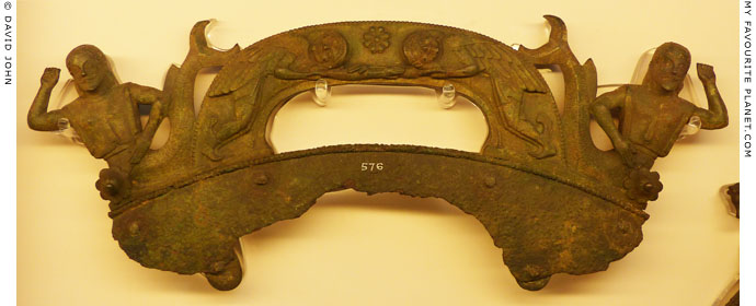 A bronze handle with Tritons and sleeping Gorgons at My Favourite Planet A bronze handle with Tritons and sleeping Gorgons at My Favourite Planet