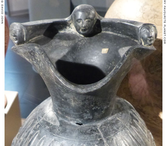 Protomes on the trefoil mouth of the Etruscan bucchero oinochoe in Milan at My Favourite Planet