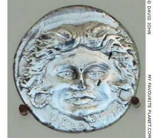 Gorgoneion on a coin of Julius Caesar at My Favourite Planet Gorgoneion on a coin of Julius Caesar at My Favourite Planet