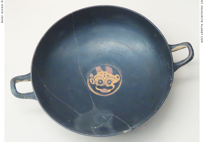 Gorgoneion on the tondo of a kylix from Kamiros, Rhodes at My Favourite Planet Gorgoneion on the tondo of a kylix from Kamiros, Rhodes at My Favourite Planet