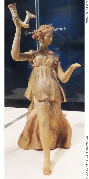 Terracotta statuette of Nike holding a rhyton at My Favourite Planet