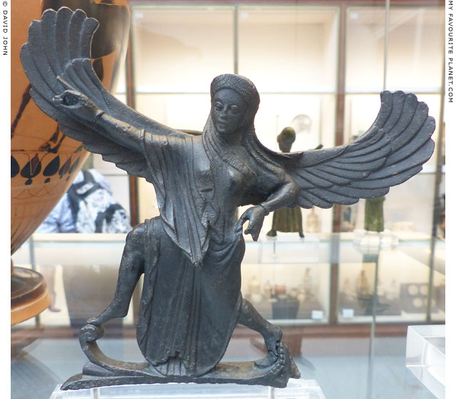 A winged goddess as a bronze attachment for a vessel at My Favourite Planet