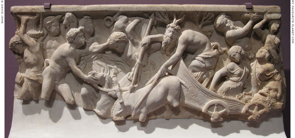 A relief depicting Pan driving a wagon in a Dionysian procession at My Favourite Planet
